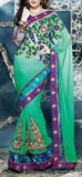 Teal green saree with all over embroidery with unique border